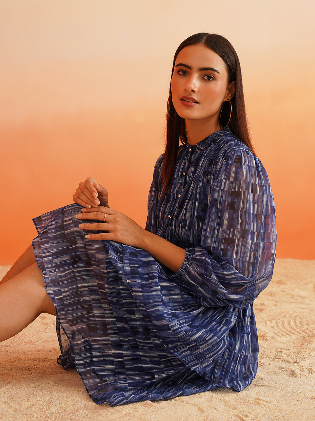 Rhythmic Ruffles Groove into Chic with Abstract Blue Dress Beatnik India