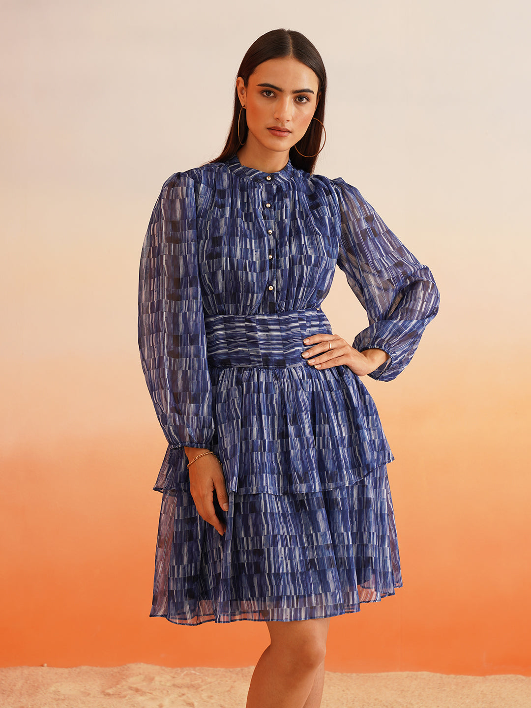Rhythmic Ruffles Groove into Chic with Abstract Blue Dress Beatnik India